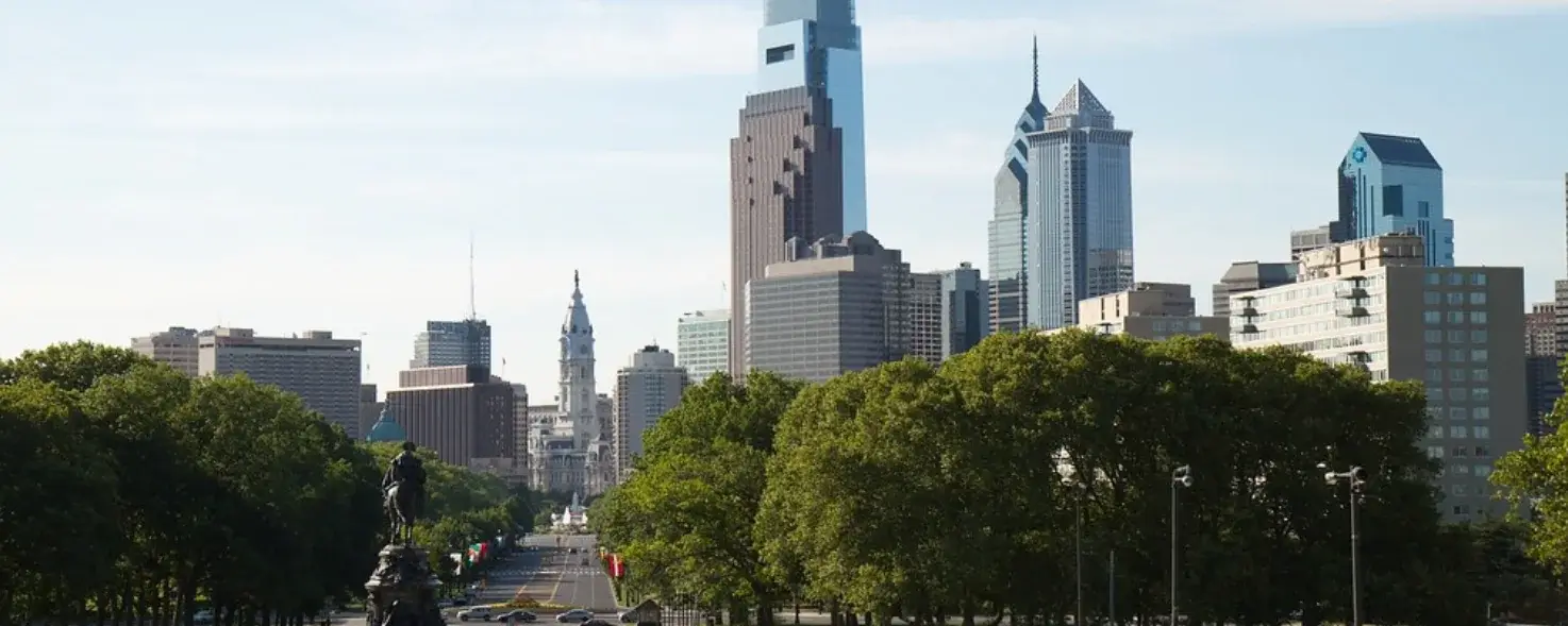 Philadelphia skyline and Benjamin Franklin Parkway in daylight