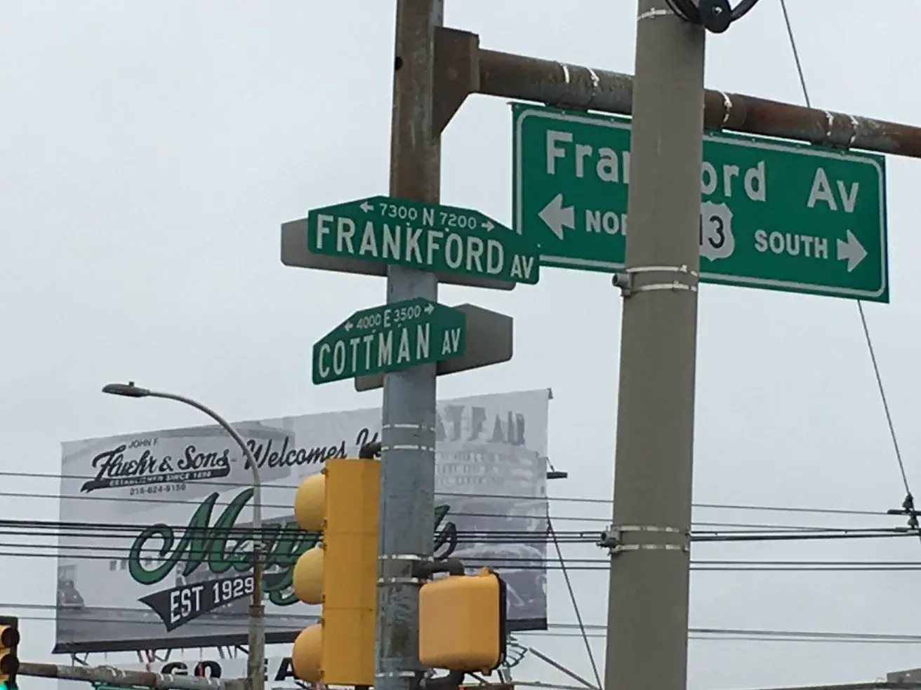 Frankford Avenue and Cottman Avenue signs in Mayfair